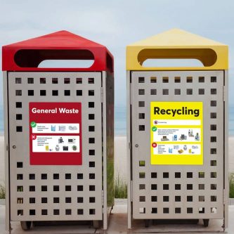 big vinyl labels on a rubbish and recycling bin